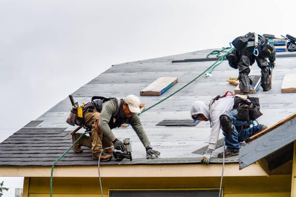 Professional Gutter Installation technician working in Georgetown, MA